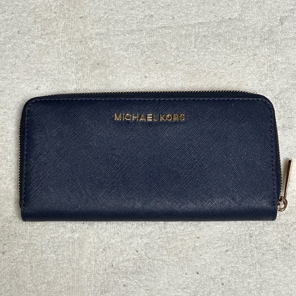 Michael Kors Handbags - Michael Kors Blue Accordion Wallet. In Excellent Condition. L 8” x H 4”.